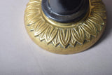 Pair of Art Deco solid brass wall sconces from the 1930s featuring a fist holding torch design, ideal for vintage and antique home décor.
