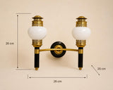 Vintage Brass and Black Double-Arm Wall Sconces, Opal Glass Globes, Pierced Filigree Caps, Pair