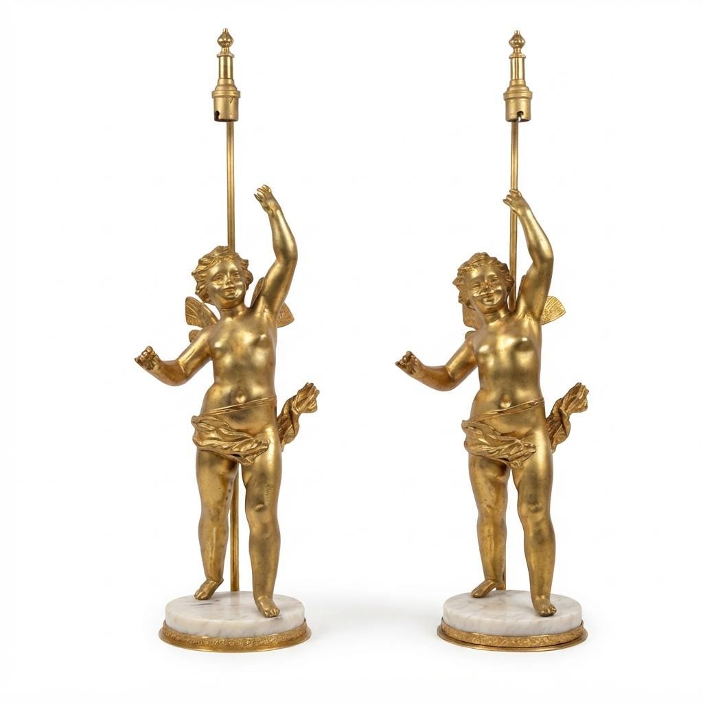 Pair of French Gilt Putti Table Lamps, Winged Cherub Figures on White Marble Bases — France, Early 20th Century