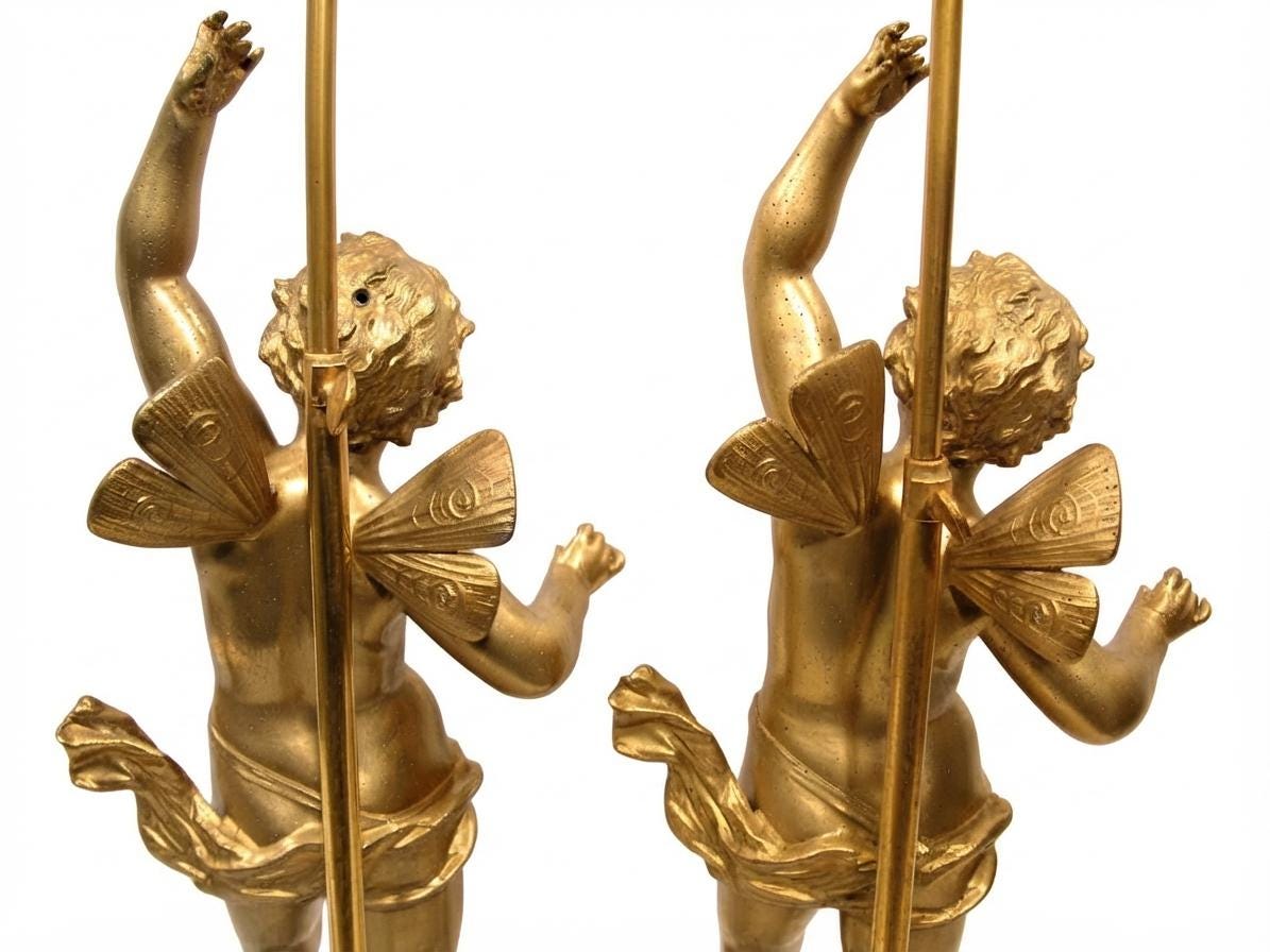 Pair of French Gilt Putti Table Lamps, Winged Cherub Figures on White Marble Bases — France, Early 20th Century