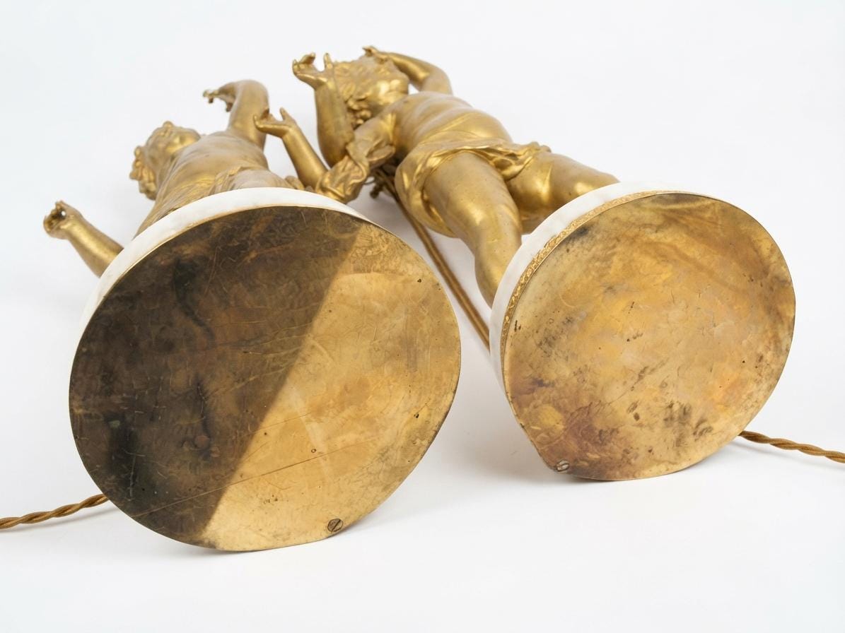 Pair of French Gilt Putti Table Lamps, Winged Cherub Figures on White Marble Bases — France, Early 20th Century