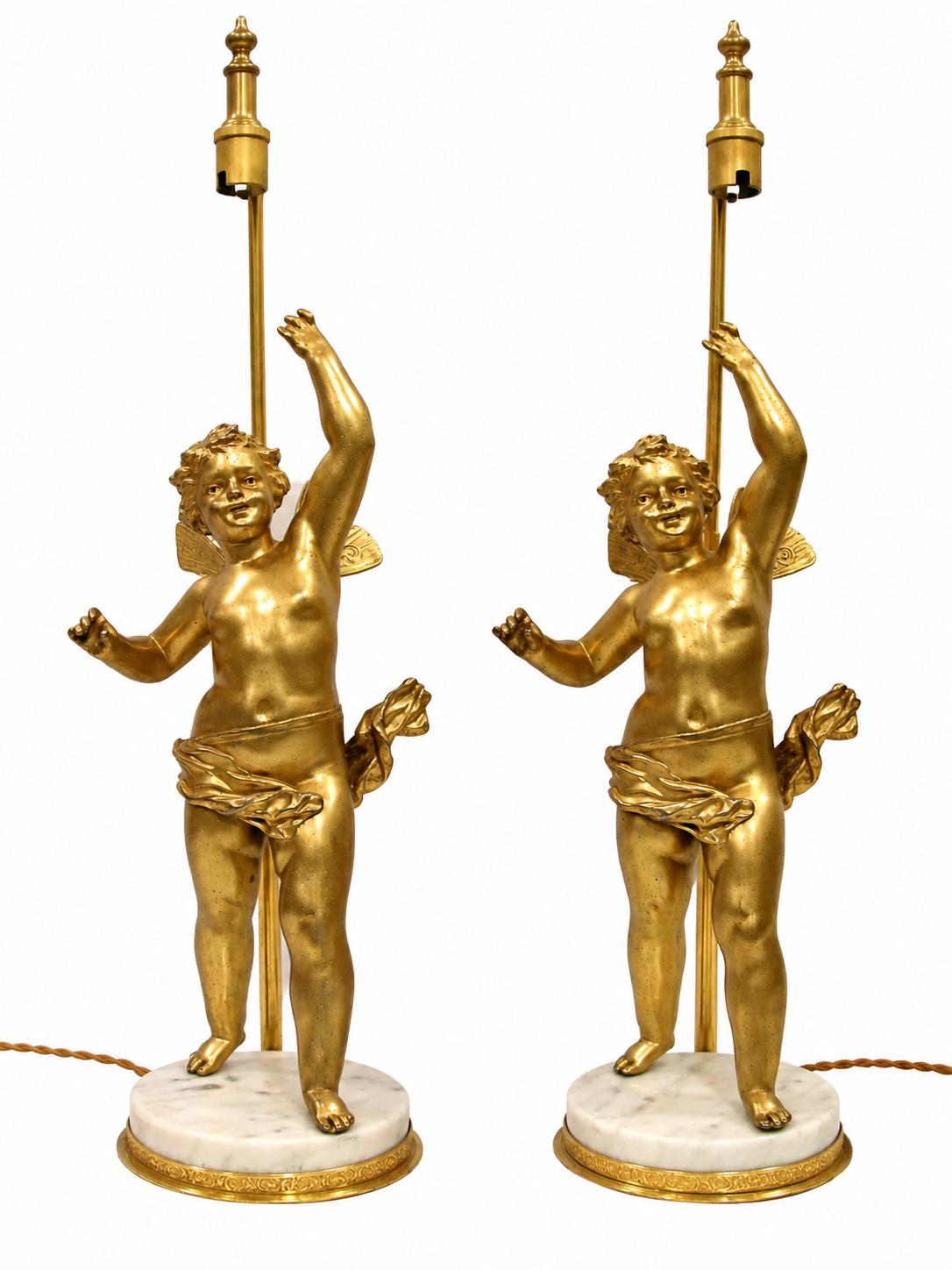 Pair of French Gilt Putti Table Lamps, Winged Cherub Figures on White Marble Bases — France, Early 20th Century