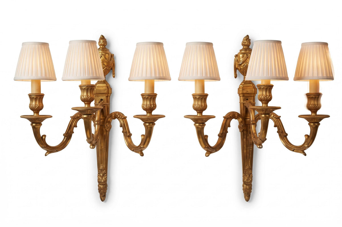 Pair of French Neoclassical Style Patinated Metal Three-Light Wall Sconces Mid 20th