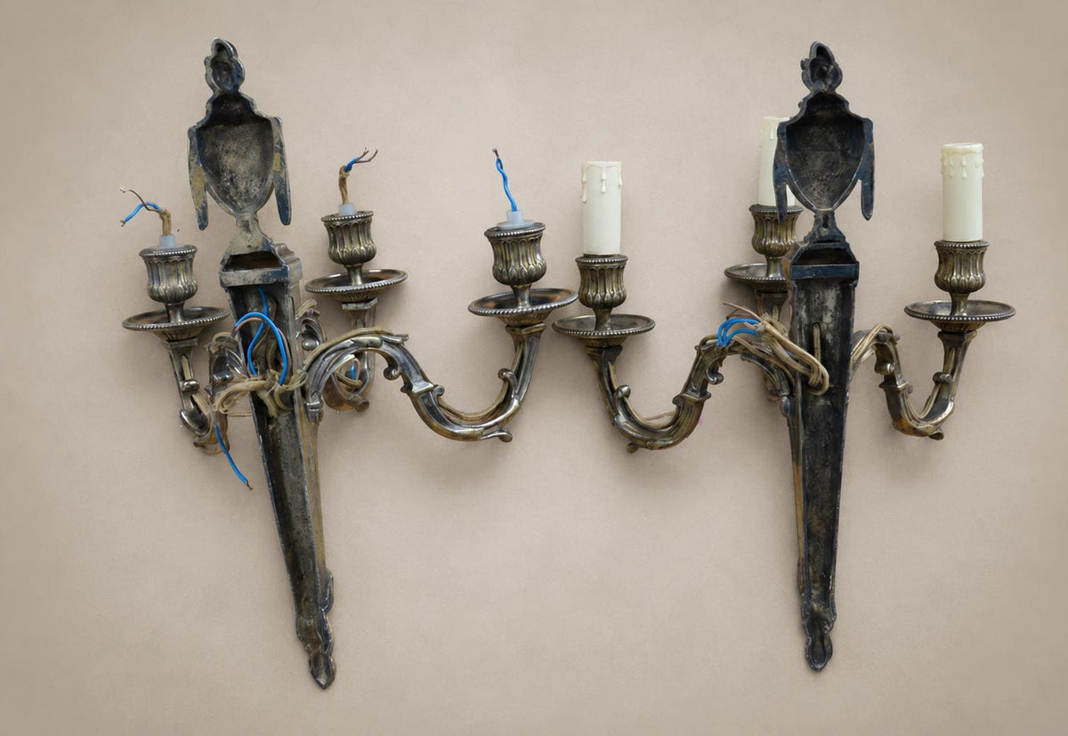 Pair of French Neoclassical Style Patinated Metal Three-Light Wall Sconces Mid 20th