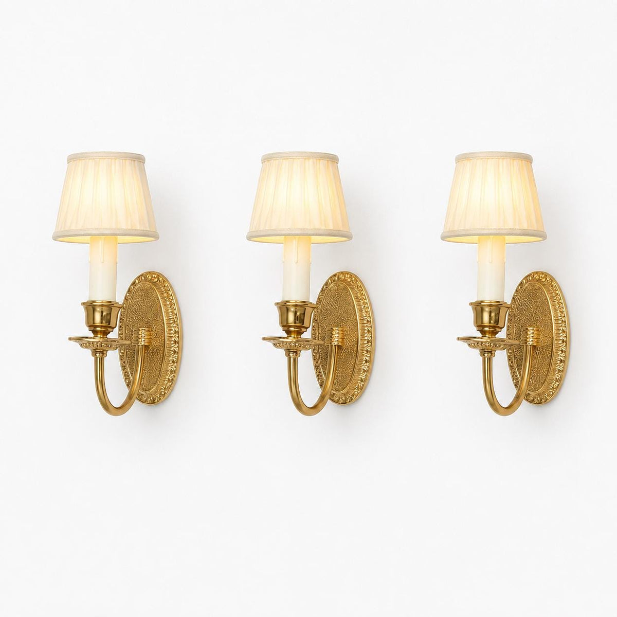 Louis XVI Style Wall Sconces Set of Three, Gilt Metal Single Arm Sconces with Oval Beaded Backplates