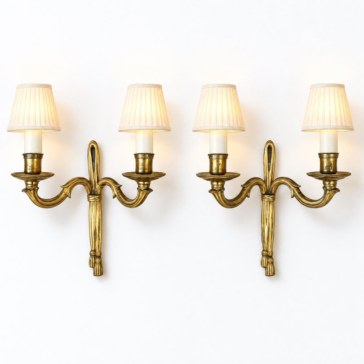 Louis XVI Style Ribbon Wall Sconces Pair, Gilt Metal Two Arm Sconces with Tassels — French