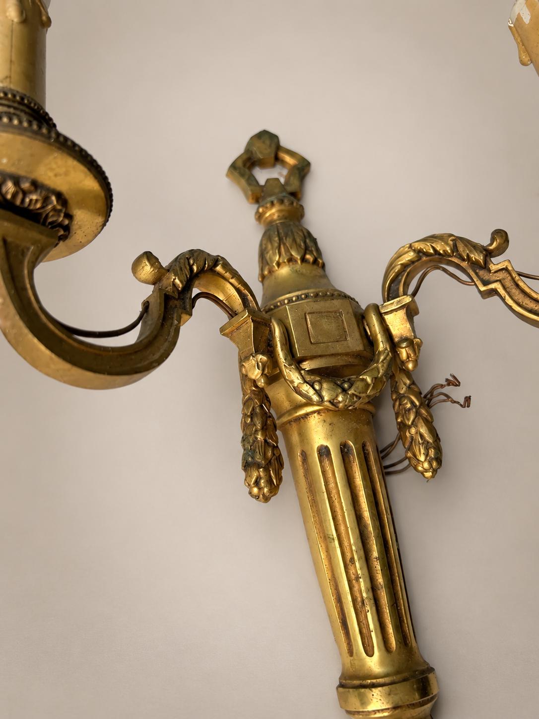 Pair of French Neoclassical Style Patinated Metal Two-Light Wall Sconces Mid 20th Century