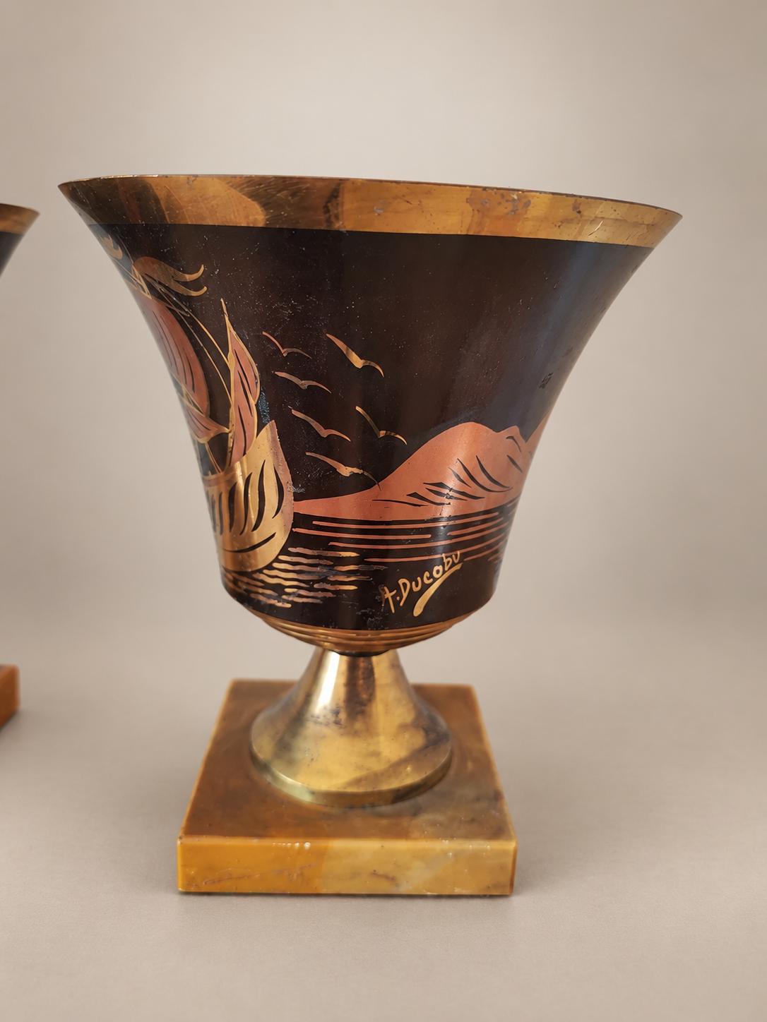 Pair of Belgian Art Deco Brass Vases, Signed A. Ducobu, Marine Scene on Onyx Bases — Belgium, circa 1930