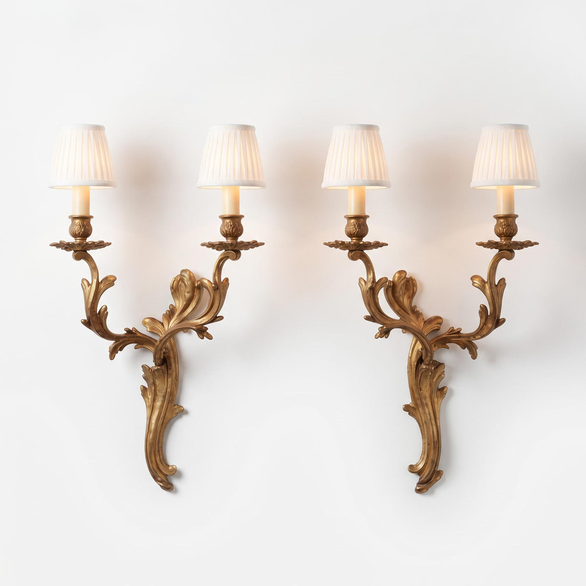 Large Pair of French Rococo Style Patinated Brass Two-Light Wall Sconces