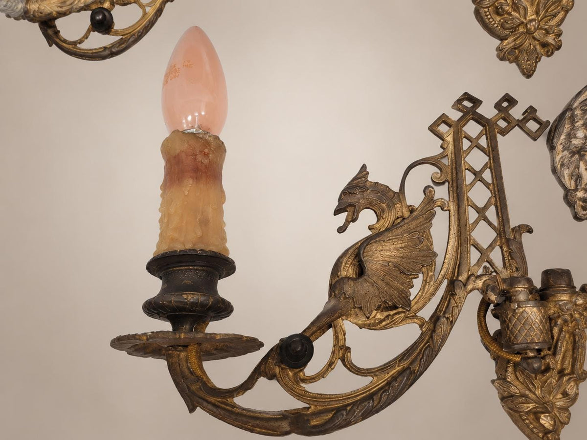 Pair of French Aesthetic Movement Patinated Metal Dragon Motif Two-Light Wall Sconces