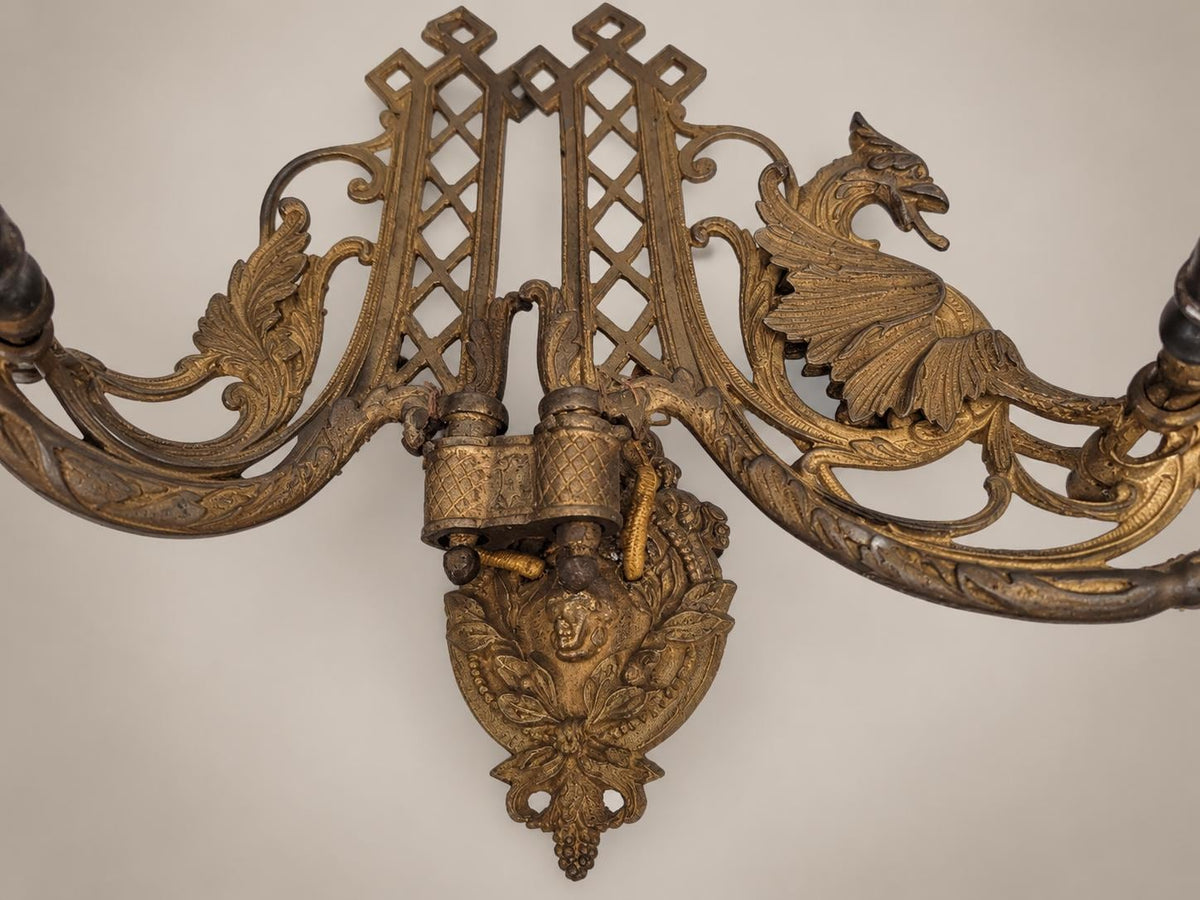 Pair of French Aesthetic Movement Patinated Metal Dragon Motif Two-Light Wall Sconces
