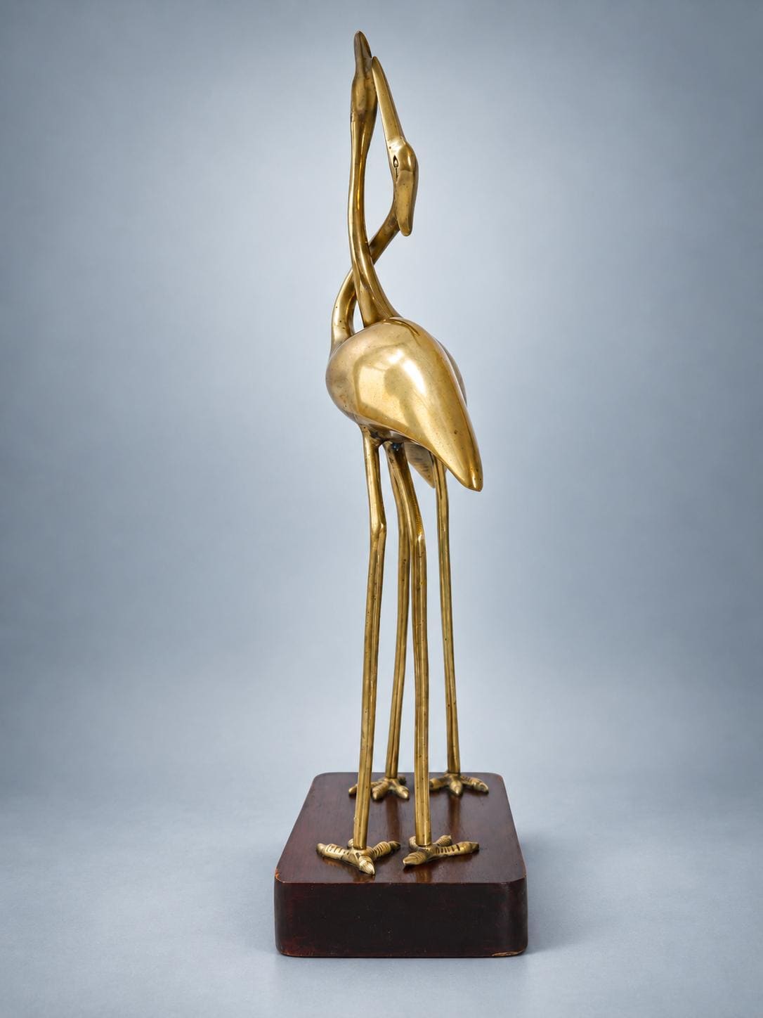 Vintage Brass Intertwined Herons Sculpture on Lacquered Wood Base — France, circa 1970