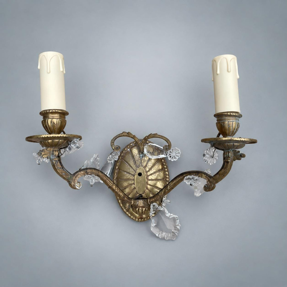 Pair of French Gilt Bronze Wall Sconces, Crystal Drops and Shell Backplate — France, Early 20th Century