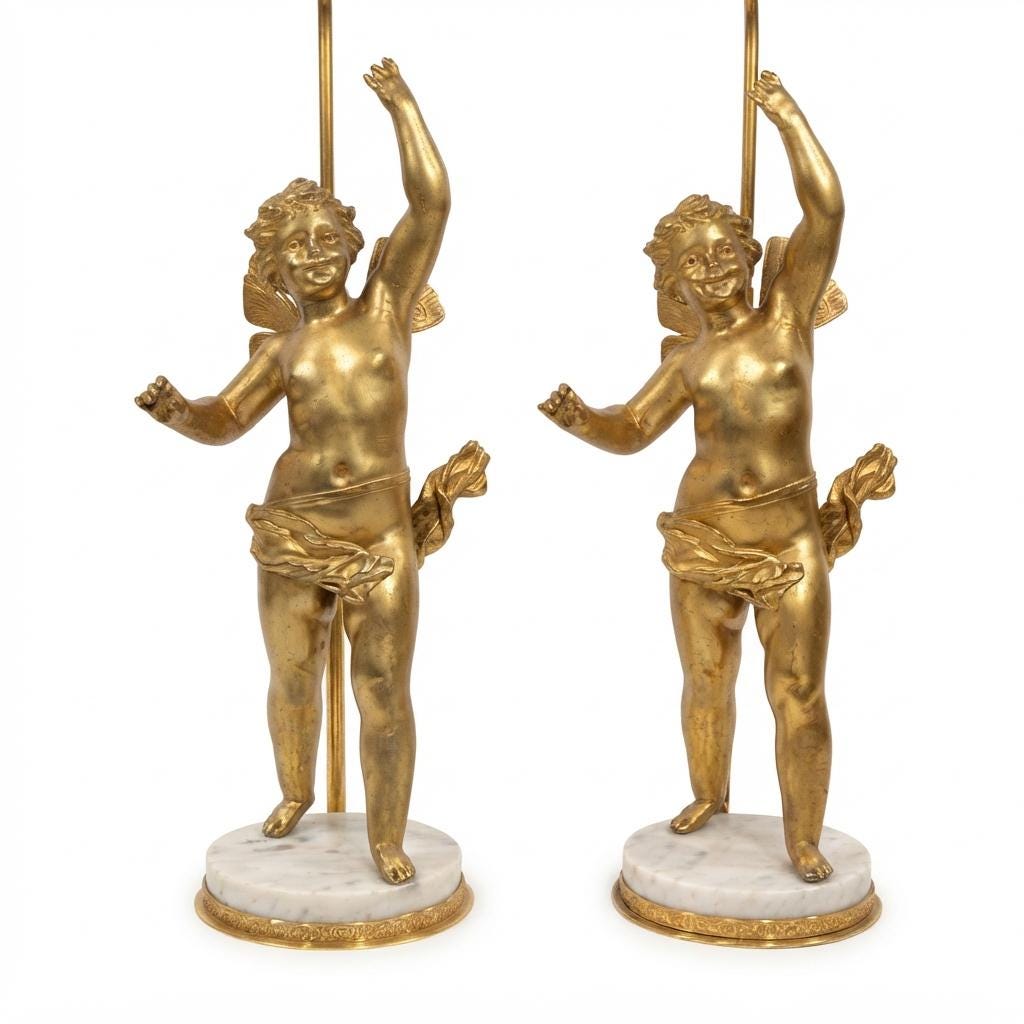 Pair of French Gilt Putti Table Lamps, Winged Cherub Figures on White Marble Bases — France, Early 20th Century