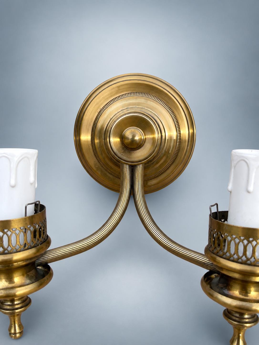 Pair of French Style Brass Two-Light Wall Sconces — Scrolled Arms with Pierced Candle Cup Galleries
