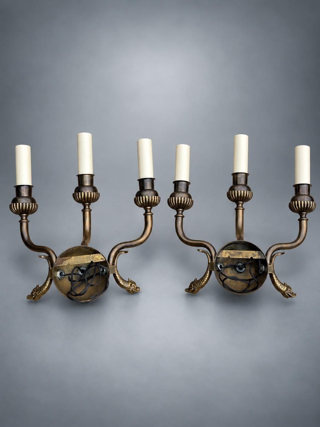 Pair of Antique Patinated Brass Wall Sconces, Dolphin Backplate Two-Arm — France, 19th Century