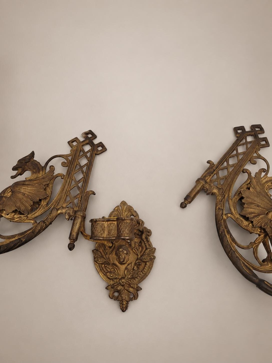 Pair of French Aesthetic Movement Patinated Metal Dragon Motif Two-Light Wall Sconces