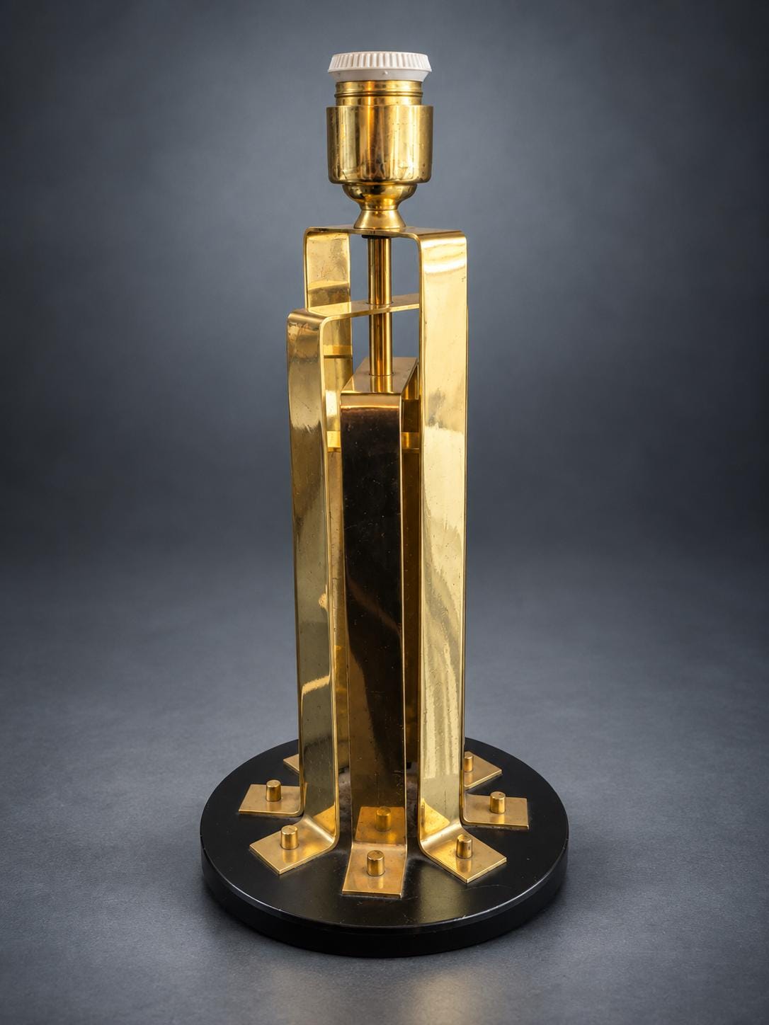 Gold-Tone Metal Table Lamp, Folded Strip Column with Bolted Feet, Round Black Base, Hollywood Regency Industrial Design