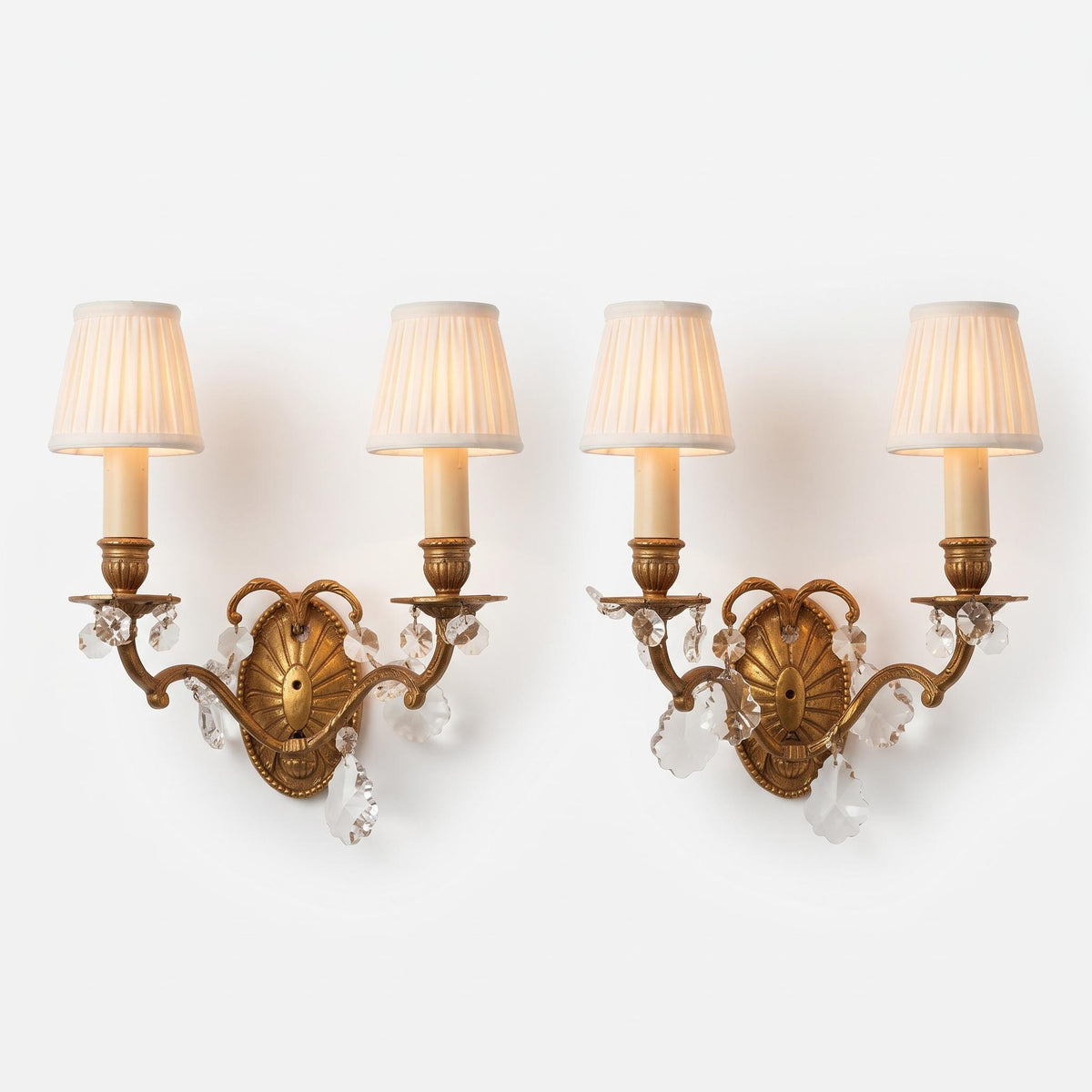 Pair of French Gilt Bronze Wall Sconces, Crystal Drops and Shell Backplate — France, Early 20th Century