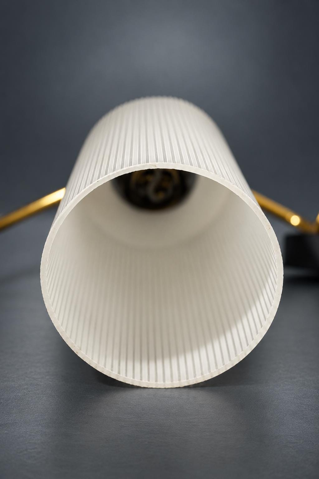 Pair of Mid-Century Double Wall Sconces, Ribbed Milk Glass Cylinders, Matte Black and Gold-Tone Metal Arms