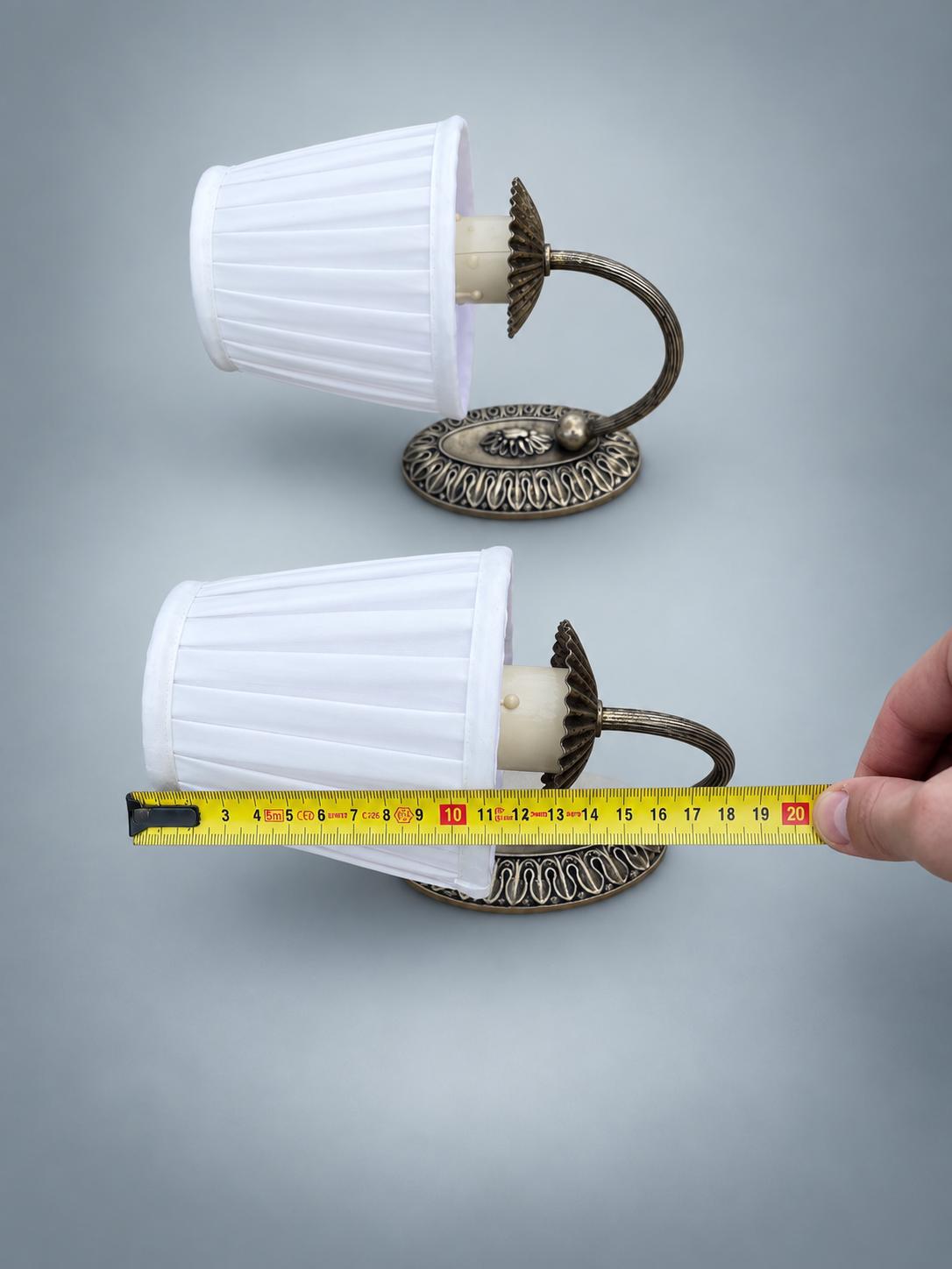 Pair of Vintage Silvered Metal Wall Sconces — Pierced Oval Backplate with Scrolled Ring Arm, Pleated Shades