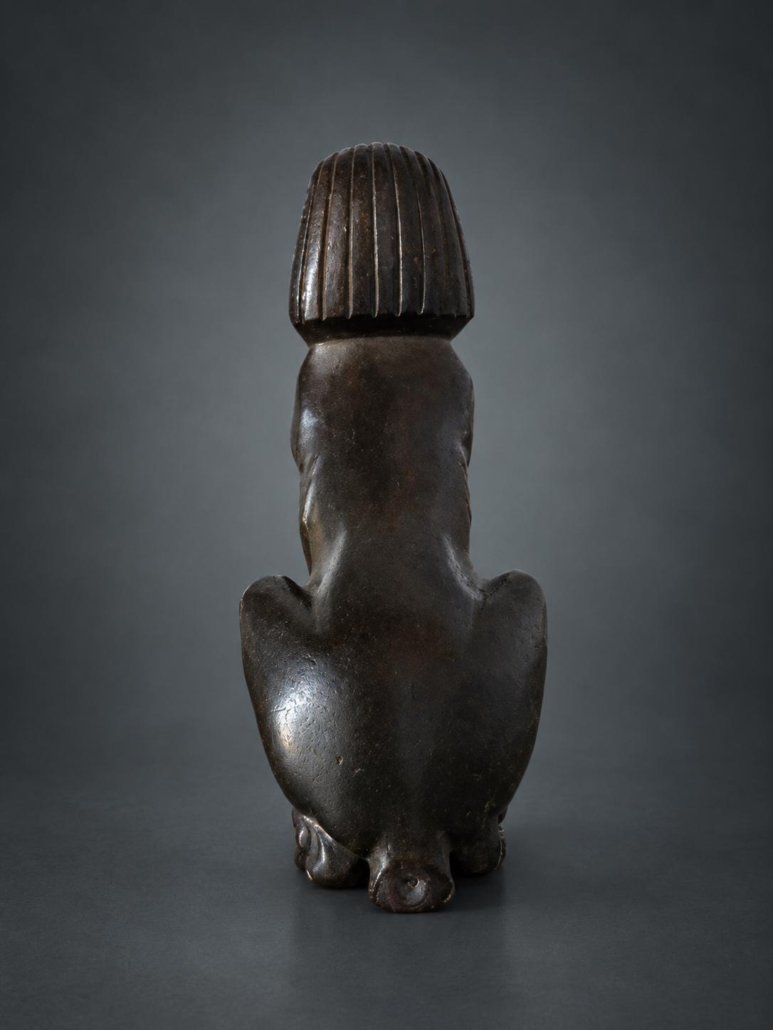 Egyptian Revival Style Seated Sphinx Figure, Dark Patinated Metal, Nemes Headdress, Former Clock or Furniture Mount