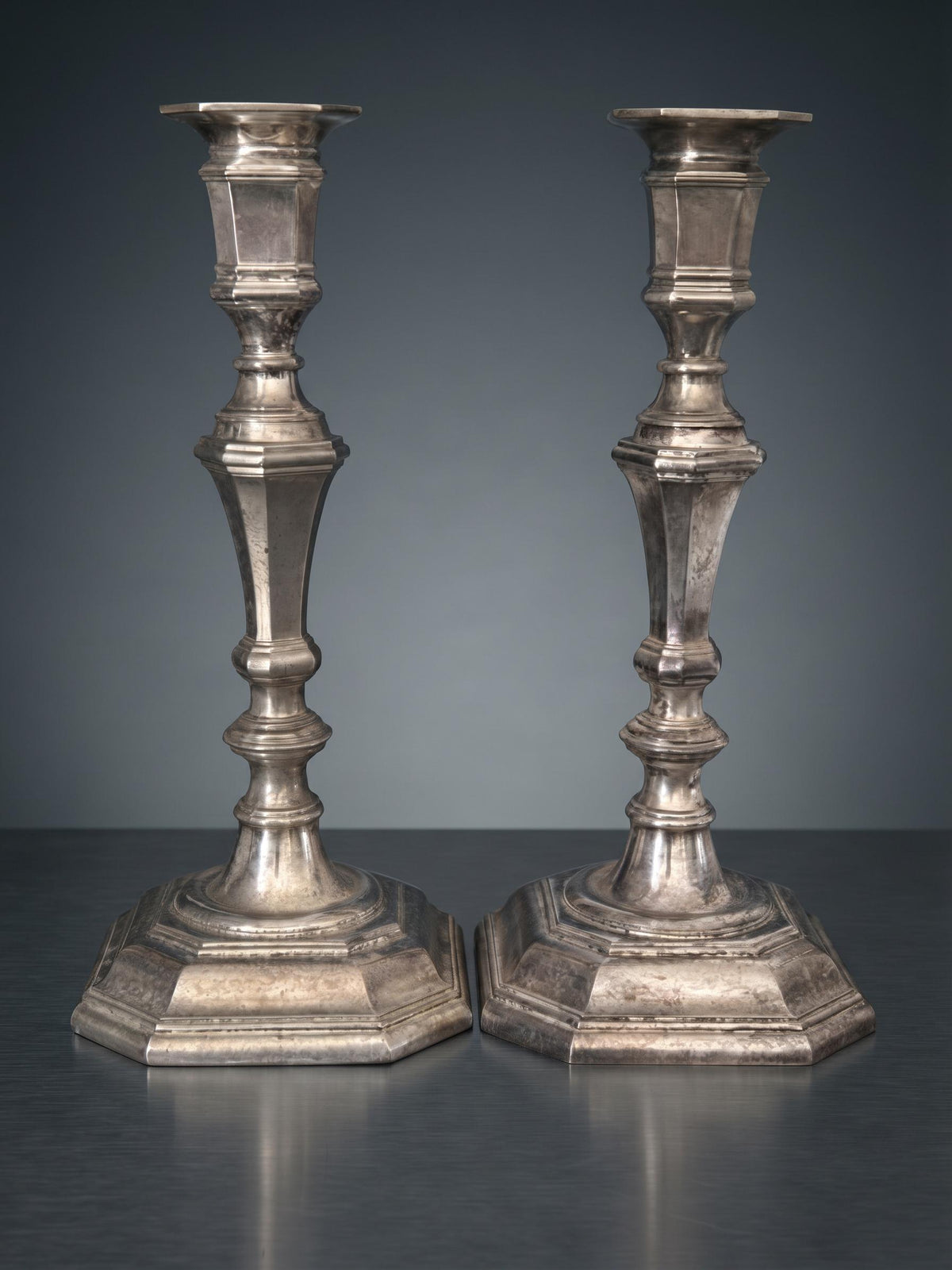 Pair of Louis XIV Style Octagonal Candlesticks, Silver-Tone Metal, Faceted Baluster Stems and Stepped Bases