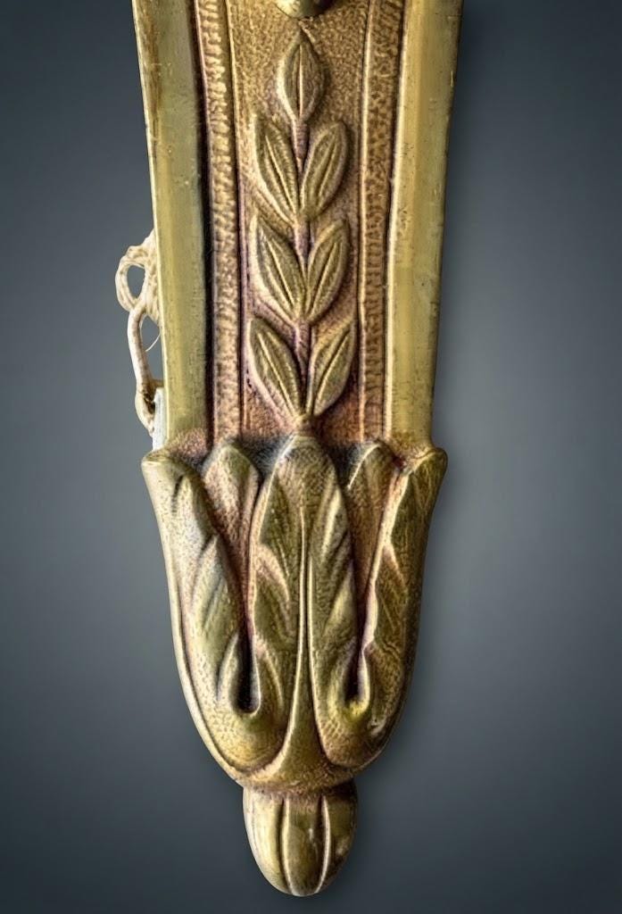 Pair of Louis XVI Style Two-Arm Wall Sconces, Gilt Metal with Acanthus Arms and Shield-Shaped Back Plates