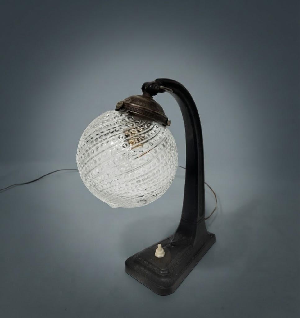 Vintage Art Deco Desk Lamp, Arched Patinated Metal Arm on Stepped Base with Clear Patterned Glass Globe