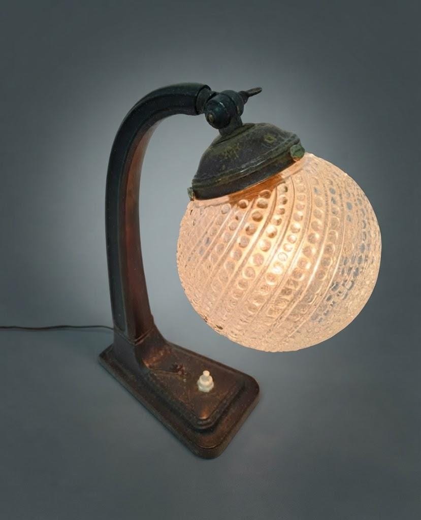 Vintage Art Deco Desk Lamp, Arched Patinated Metal Arm on Stepped Base with Clear Patterned Glass Globe