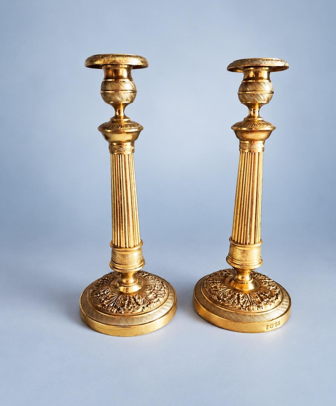 Vintage Pair of Empire Style Brass-Tone Candlesticks, Fluted Columns and Foliate Domed Bases