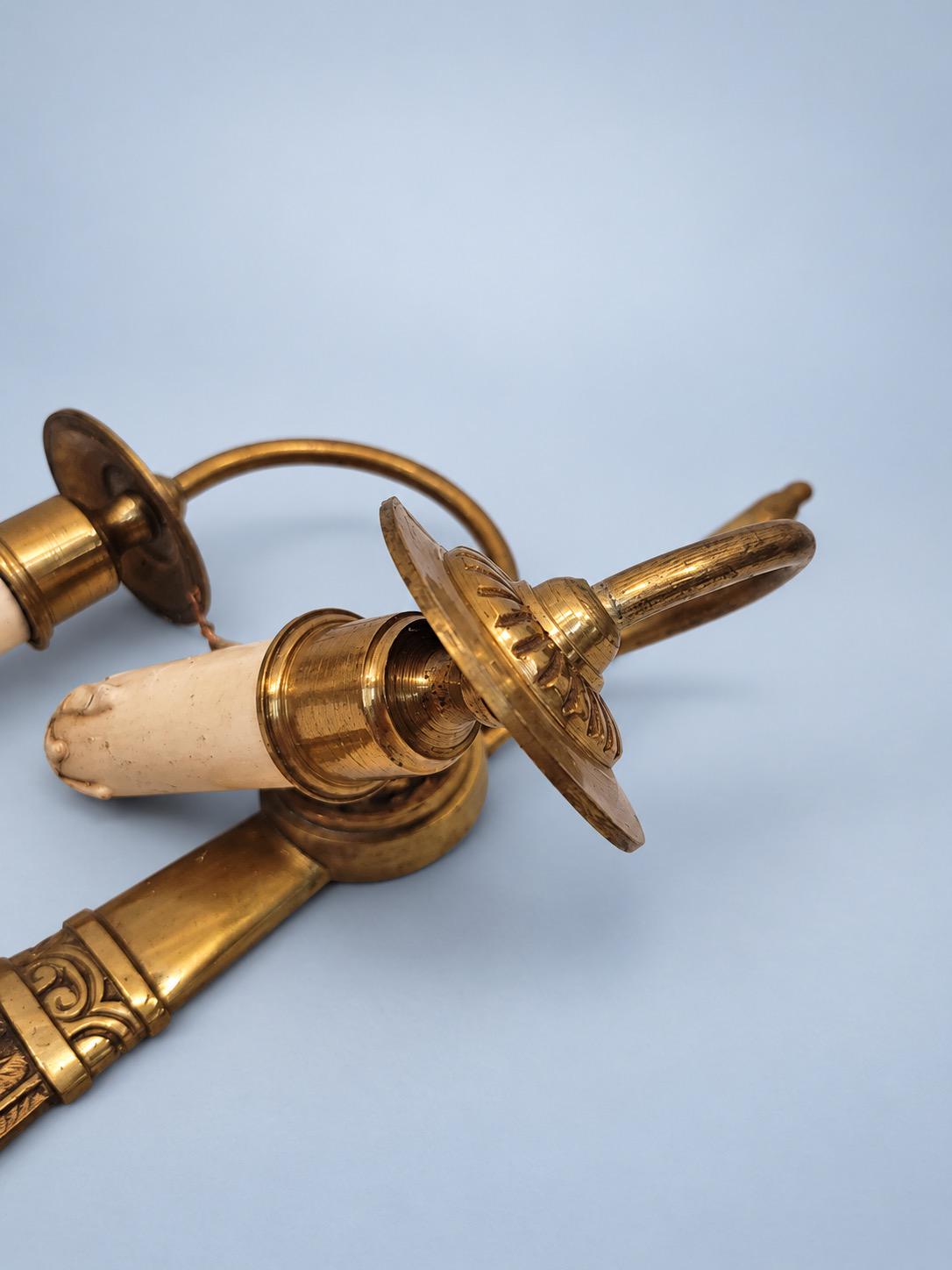 Vintage Pair of Louis XVI Style Gilt Metal Two-Arm Wall Sconces, Torch Back Plates with Rosettes and Swan-Neck Arms