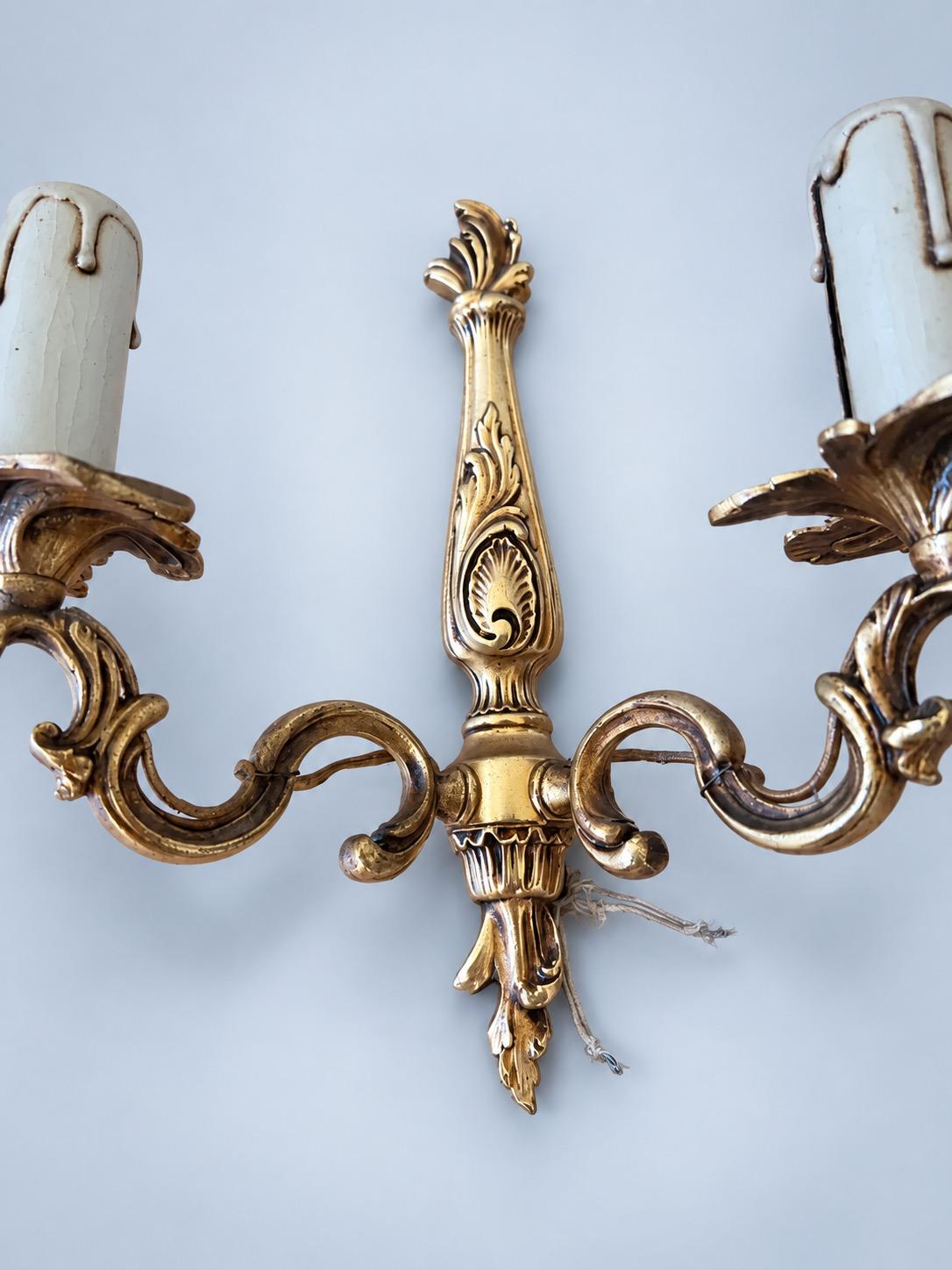 Vintage Set of Four Louis XV Style Brass-Tone Two-Arm Wall Sconces with Leaf-Shaped Drip Pans