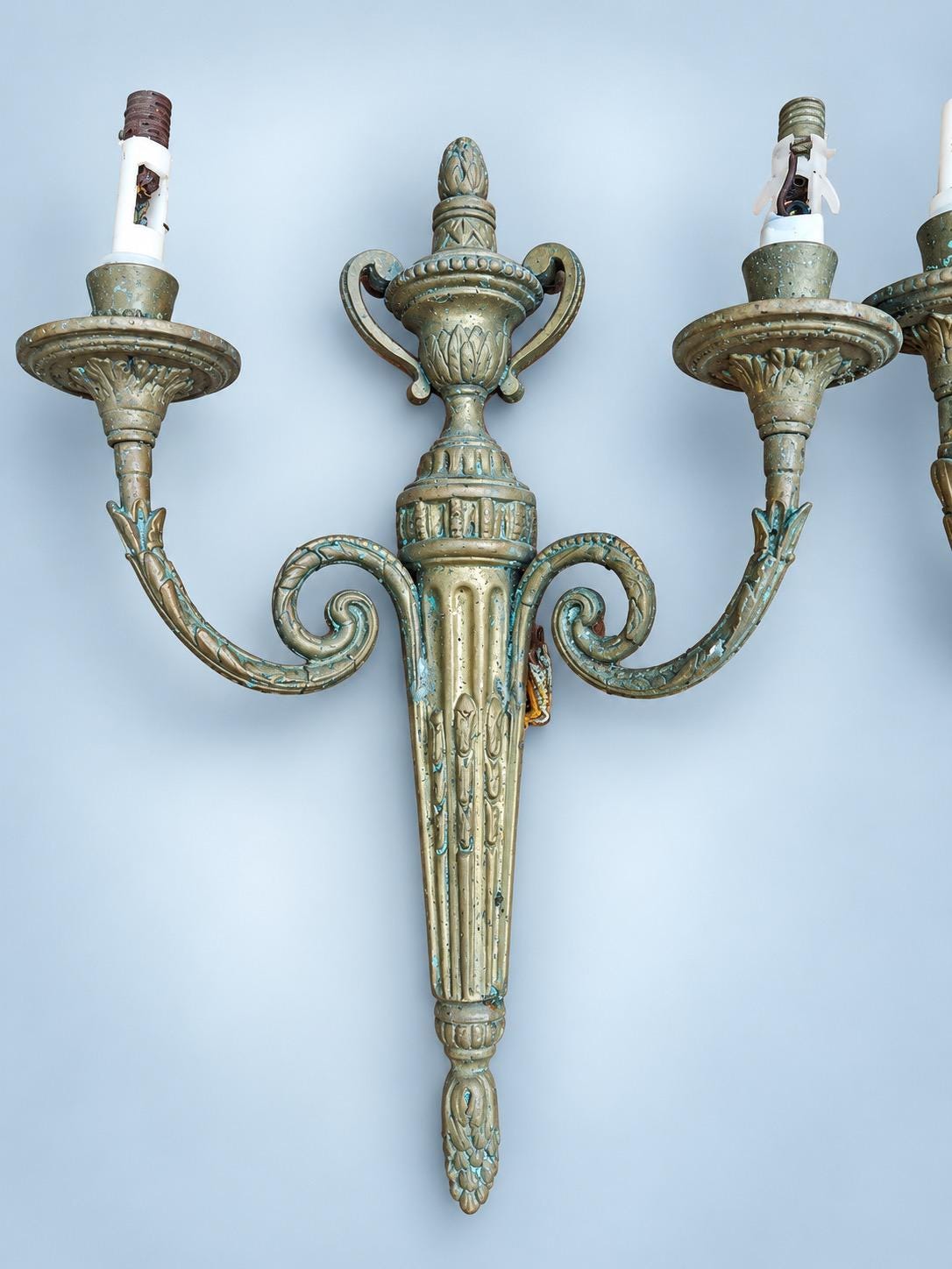 Antique Pair of Large Transition Style Bronze-Tone Two-Arm Wall Sconces with Urn Crest