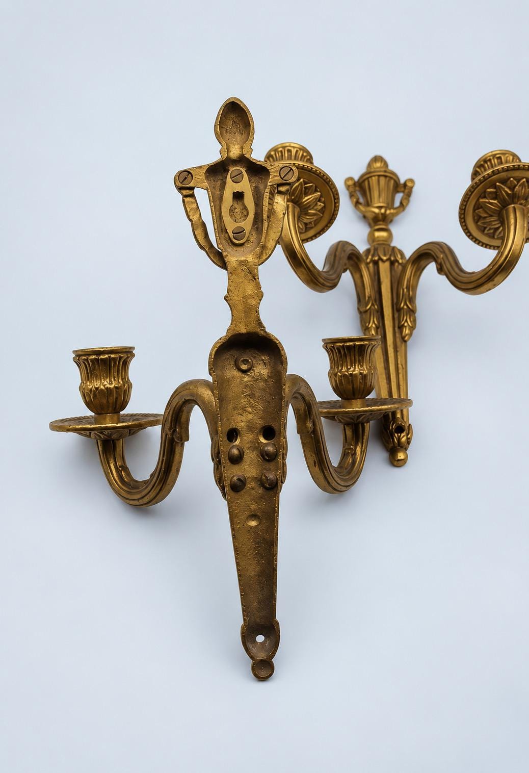 Vintage Pair of Louis XVI Style Gilt Metal Two-Arm Candle Wall Sconces with Urn Crest