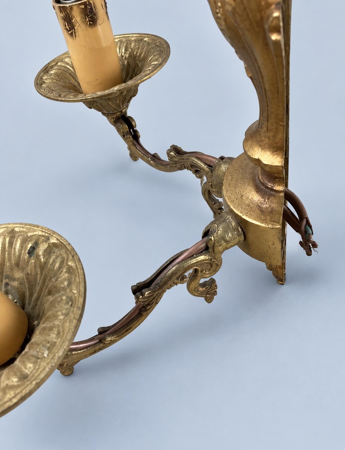 Vintage Pair of Louis XV Style Gilt Metal Two-Arm Wall Sconces with Deep Drip Pans