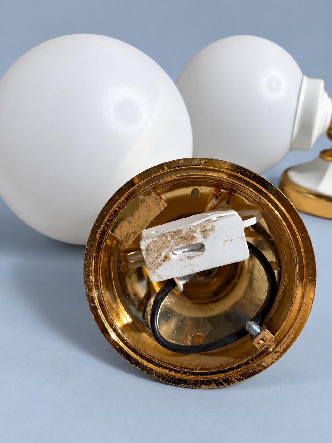 Vintage Pair of Hollywood Regency Style White and Gold-Tone Globe Wall Sconces