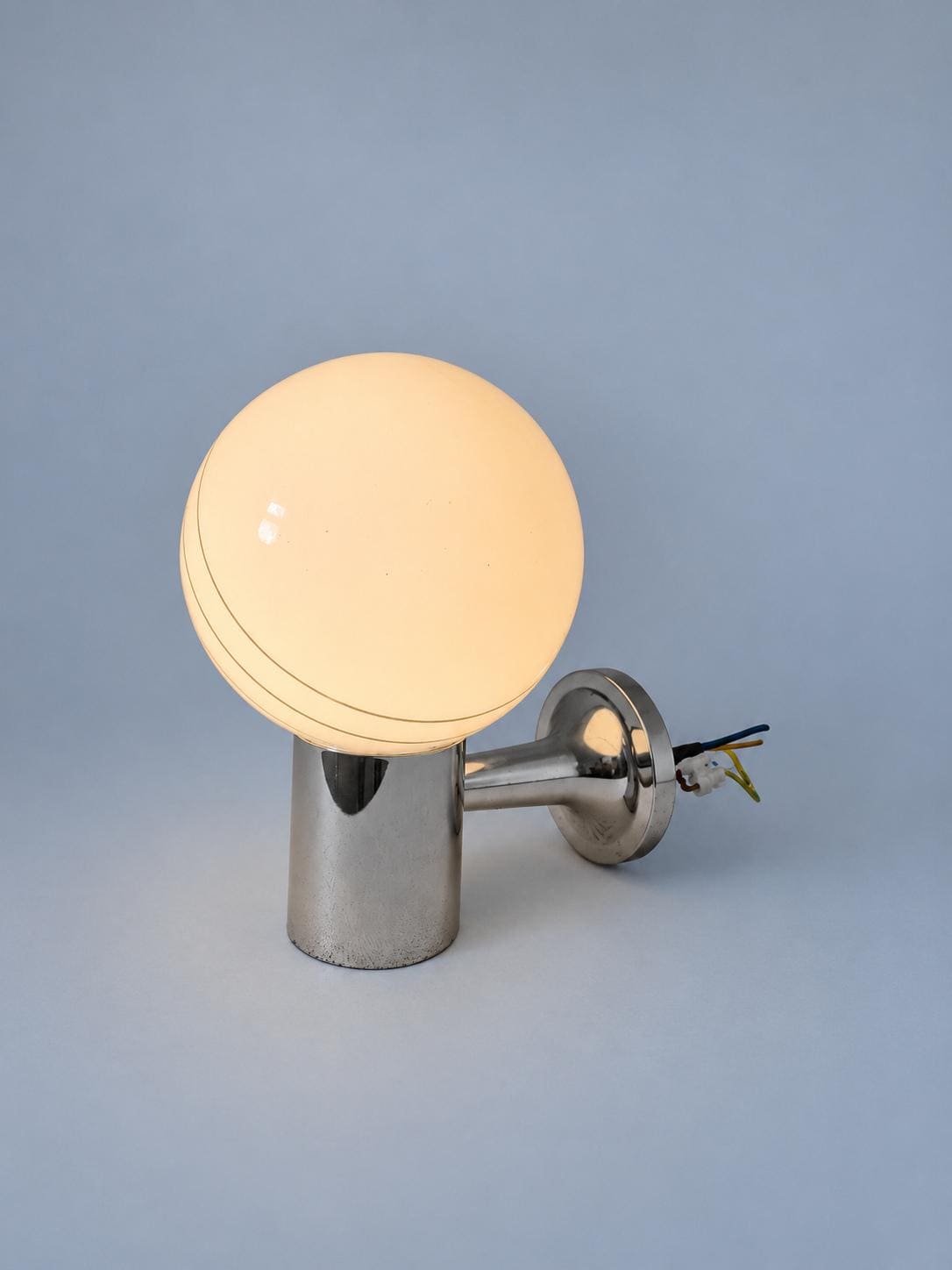 Pair of Vintage White Glass Globe Wall Sconces, Three Curved Grey Stripes, Chrome-Tone Cylinders and Round Backplates