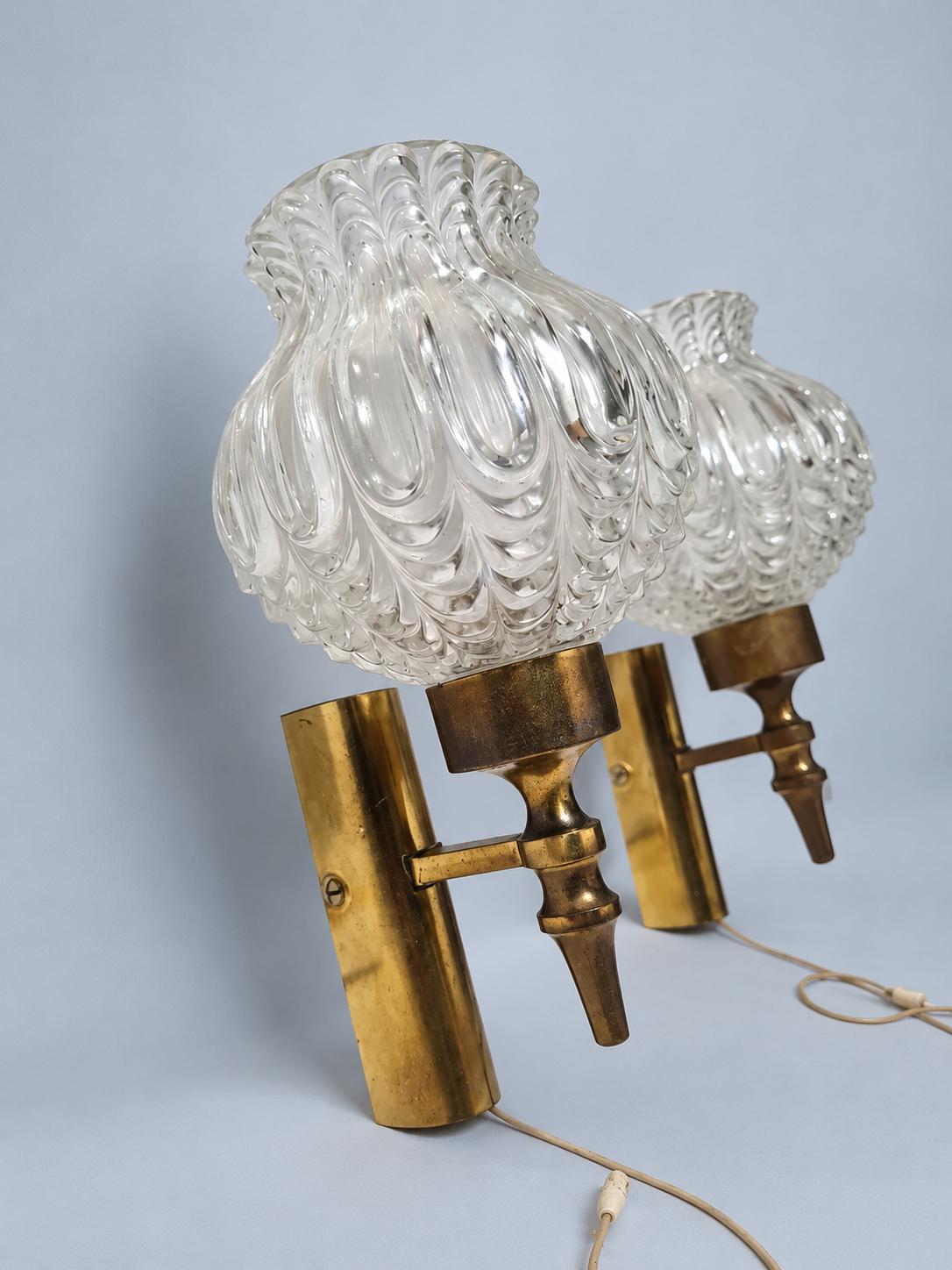 Vintage Pair of 1950s Brass-Tone Wall Sconces with Clear Teardrop-Pattern Glass Shades and Pull Cords