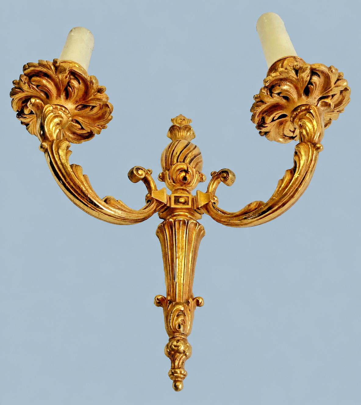 Vintage Pair of Louis XVI Style Two-Arm Gilt Metal Wall Sconces with Flame-Topped Urn and Acanthus Scroll Arms