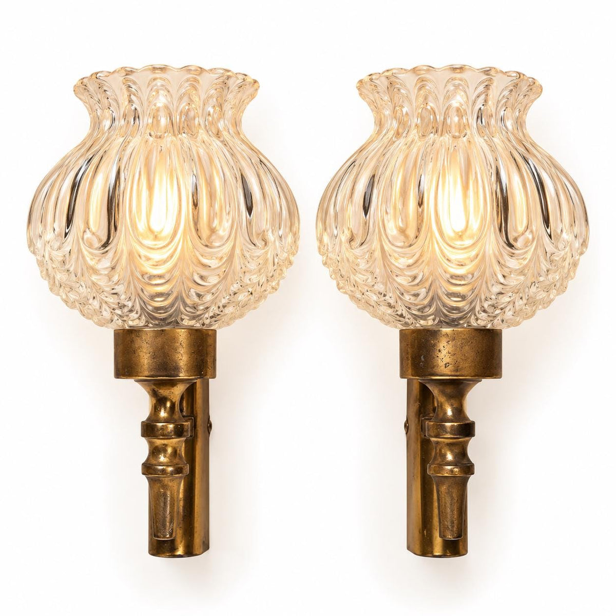 Vintage Pair of 1950s Brass-Tone Wall Sconces with Clear Teardrop-Pattern Glass Shades and Pull Cords