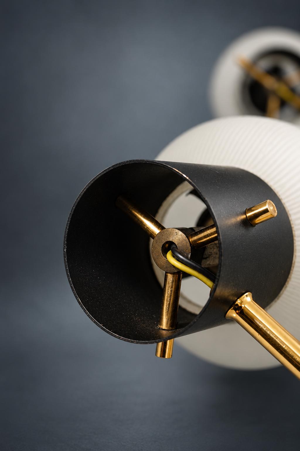 Pair of Mid-Century Double Wall Sconces, Ribbed Milk Glass Cylinders, Matte Black and Gold-Tone Metal Arms
