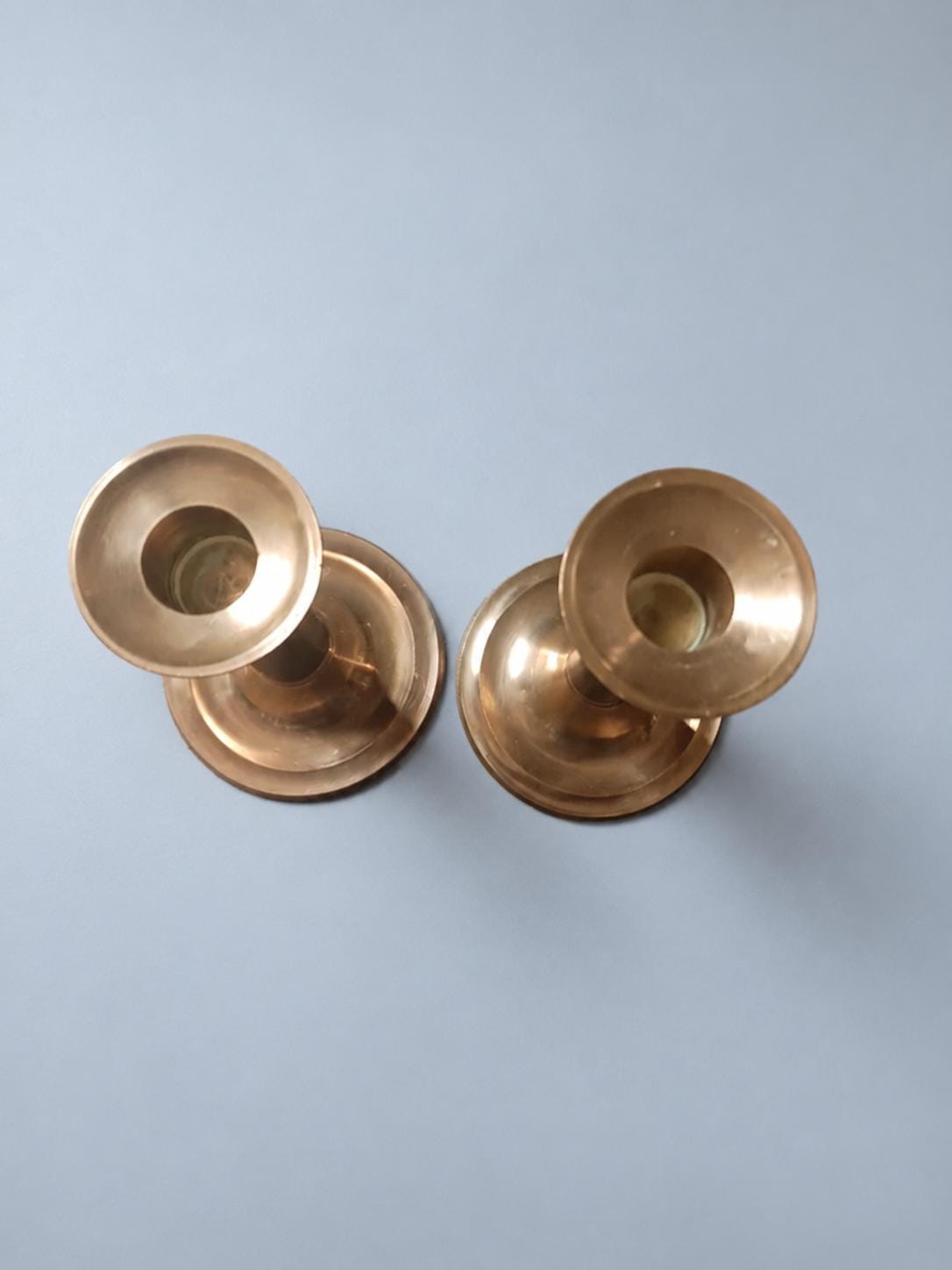 Vintage Pair of Brass-Tone Candlesticks with Black Wood Stems