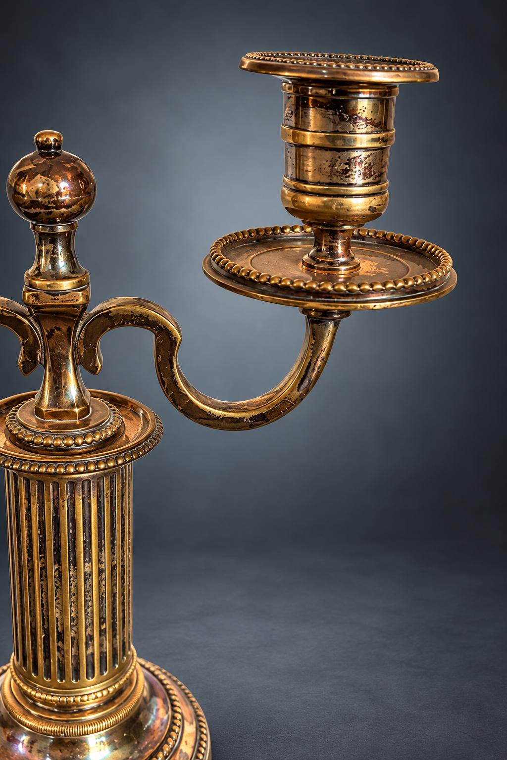 Pair of Louis XVI Style Two-Light Candelabra, Silver-Tone Metal, Fluted Columns, Beaded Round Bases, Urn Finials