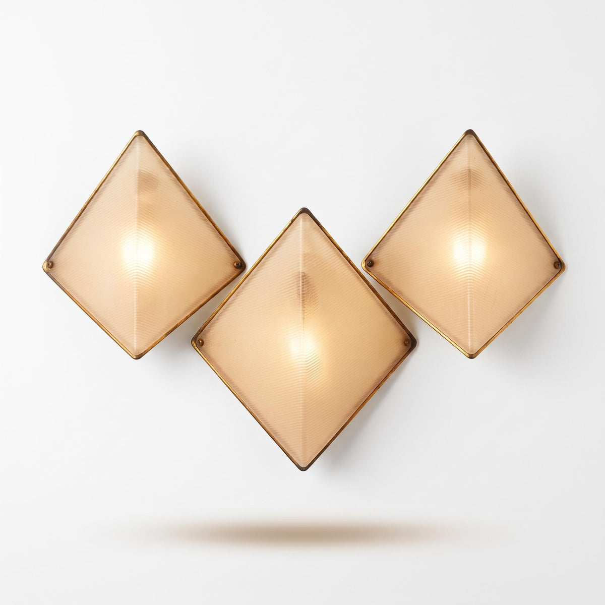 1960s–70s Diamond Wall Sconces, Set of Three, Ribbed White Perspex Panels and Black Metal Bases