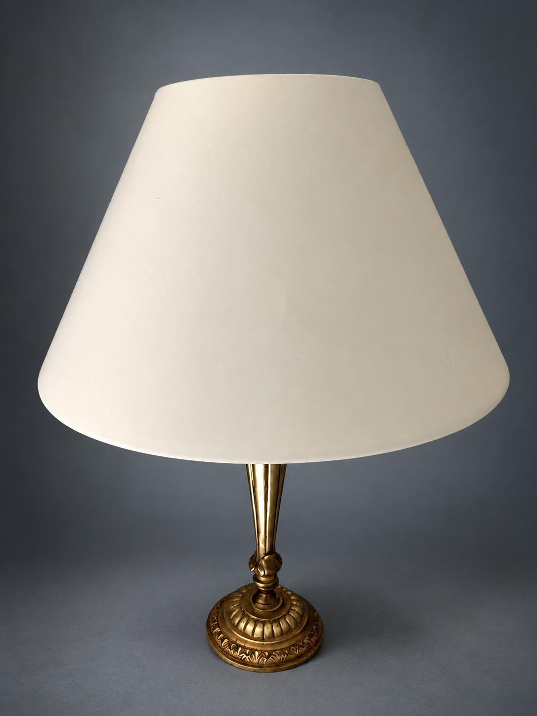 Candlestick Table Lamp in Gilt Metal, Fluted Stem with Leaf-Cast Cup and Base, Candle Sleeve, Cream Cone Shade