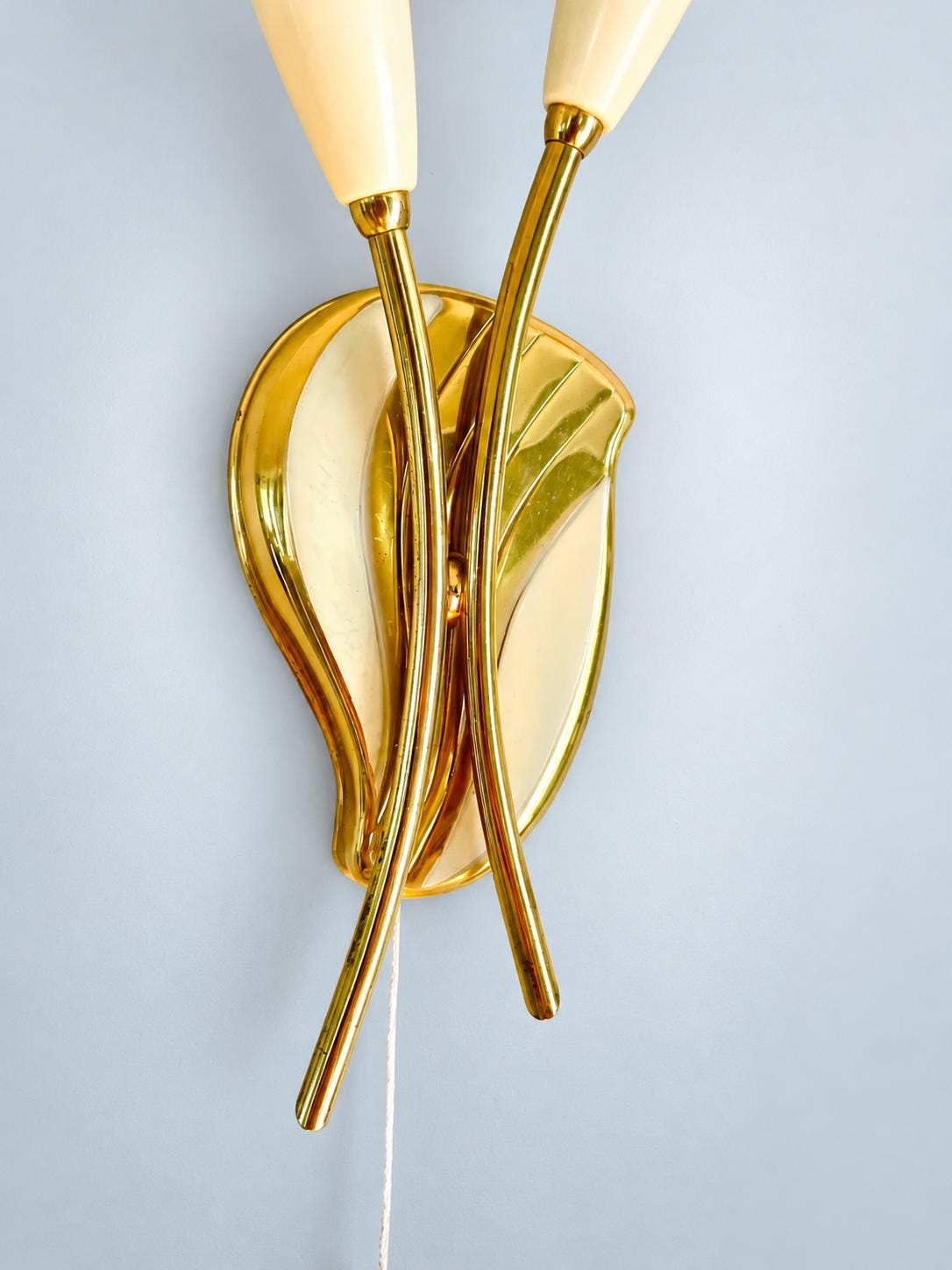 Vintage Double Wall Sconce, Attributed 1950s–60s, Gilt Metal with Crossed Arms and Ivory Lacquered Cone Shades, 25 cm