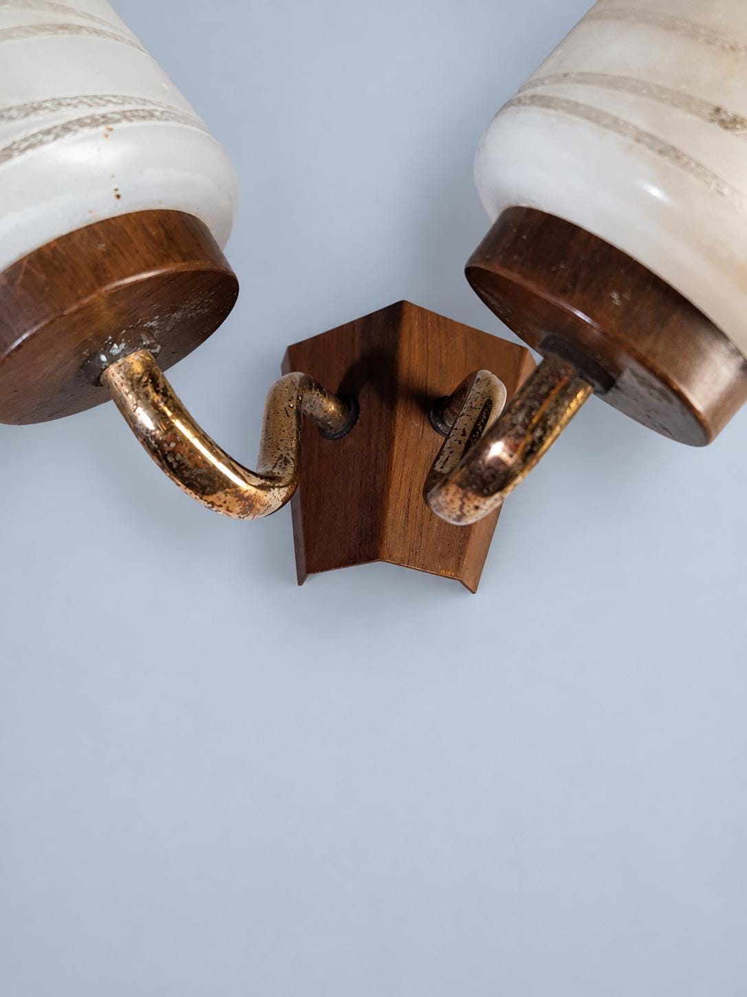 Vintage Double Wall Sconce, Attributed 1950s, White Glass Cone Shades with Line Pattern, Gilt Metal Arms on Wood-Tone Plate