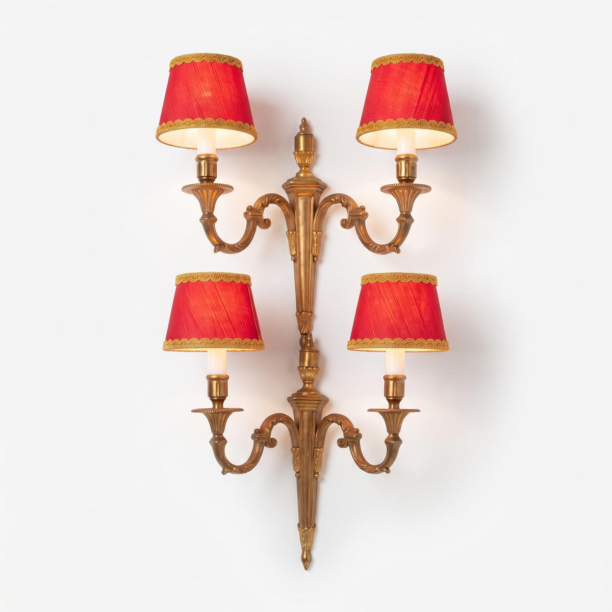 Pair of Louis XVI Style Two-Arm Wall Sconces, Gilt Metal with Urn Finials, Four Red Clip-On Shades with Gold Braid