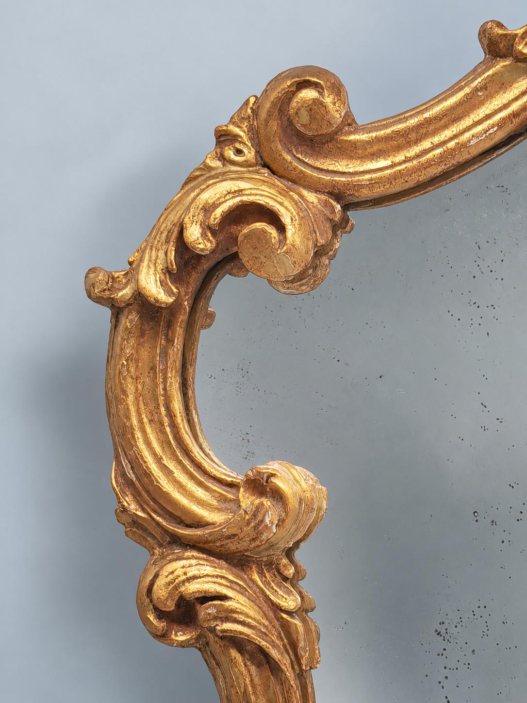 Vintage Rocaille Style Giltwood and Gilt Stucco Mirror, Shell Crest and Scrolls, Shaped Frame on Small Feet, 42 cm